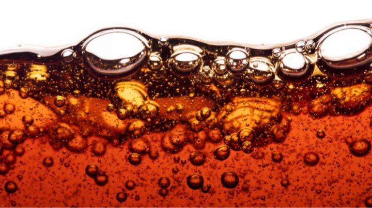 Liquid soda in a dark brown color