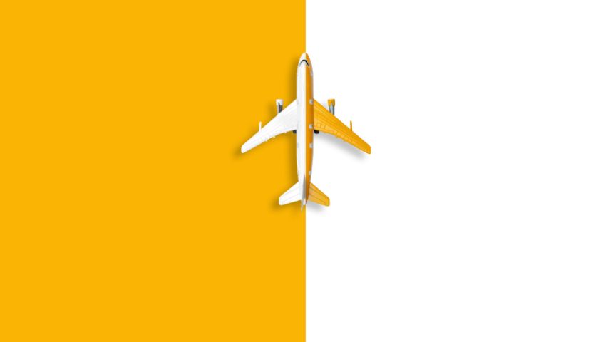 A white and yellow plane, on a yellow and white background. The colors are reversed so the plane is visible.