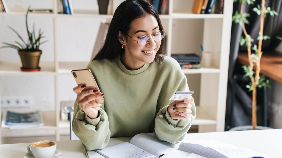 Woman holding credit card